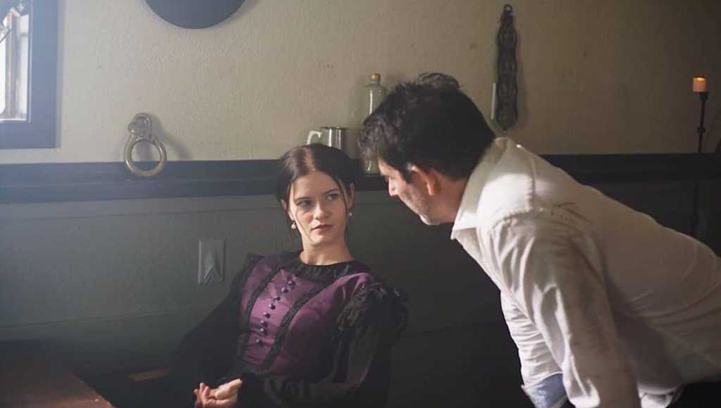Julie Bruns as Ada Lovelace with man leaning beside her