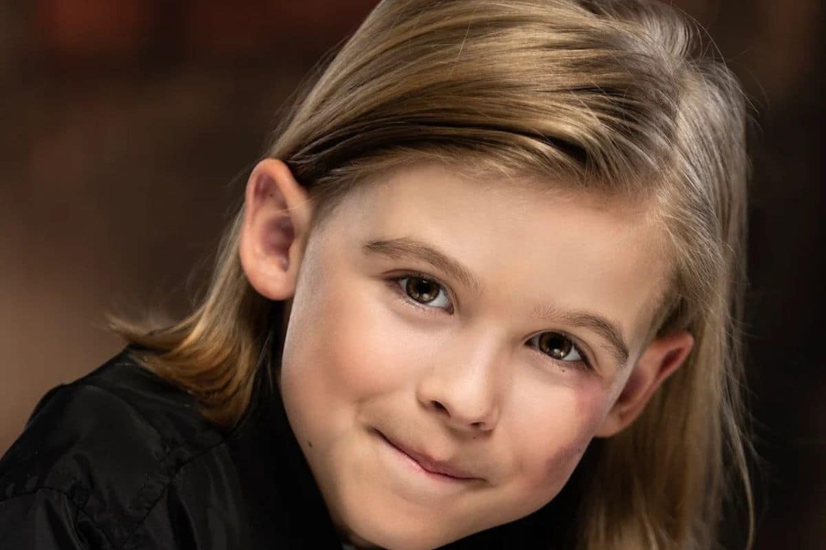 Young boy looking at camera